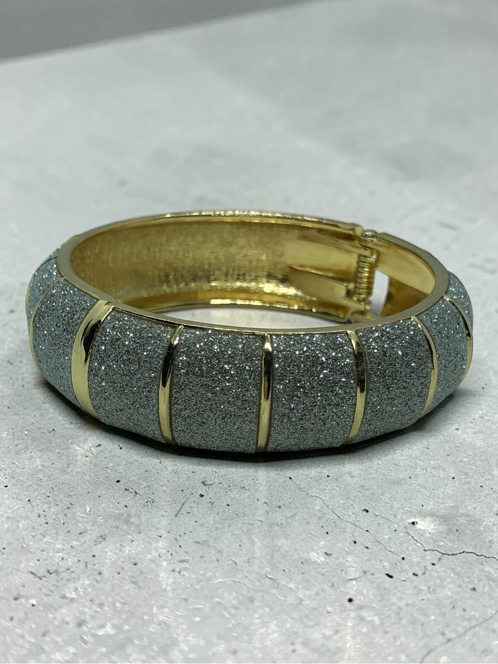 Gold-Tone Bangle Bracelet with Silver Glitter Panels